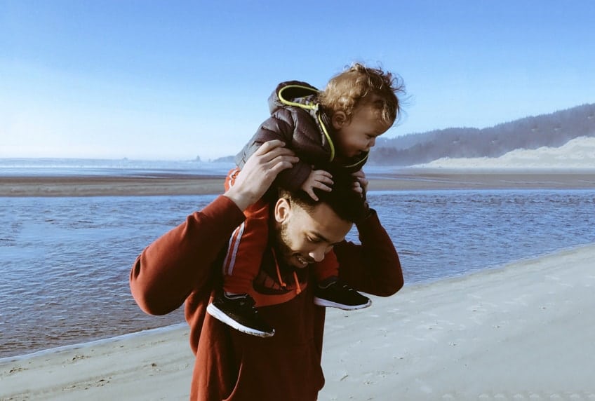 Young woman taking photograph